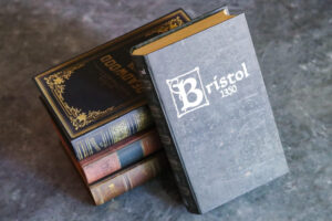 The Bristol 1350 game box, which looks like an old book